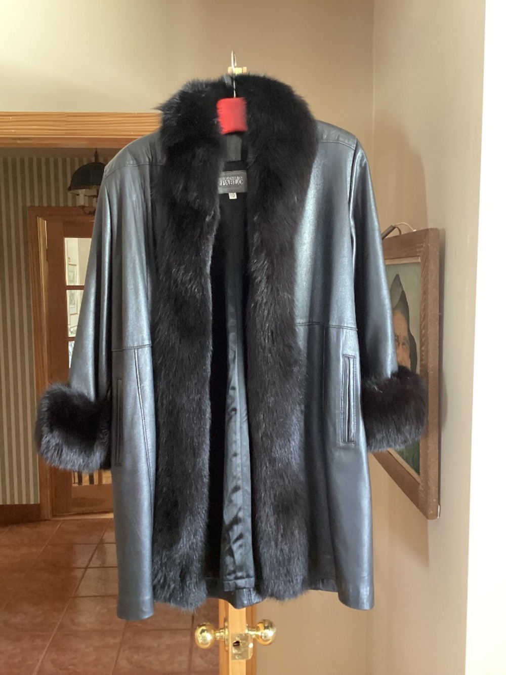 Ladies fur-trimmed leather coat
